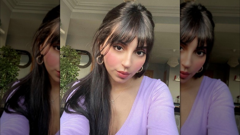 Brunette bangs and half-up style