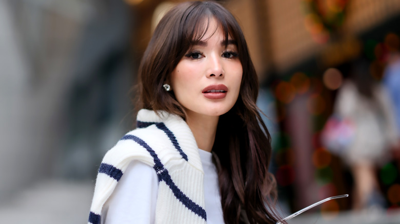 Woman with eyelash bangs