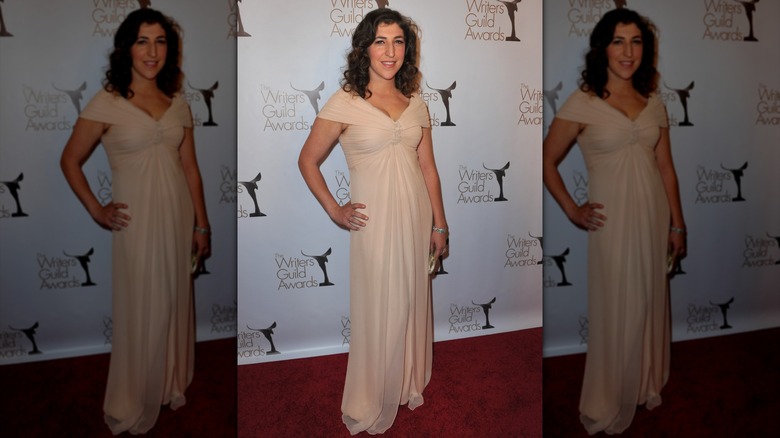 Mayim Bialik in a cream dress at the Writers Guild Awards