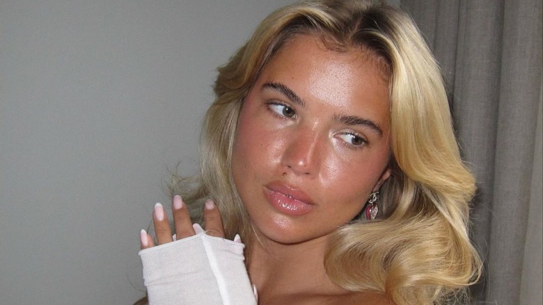 blonde woman with curtain bangs