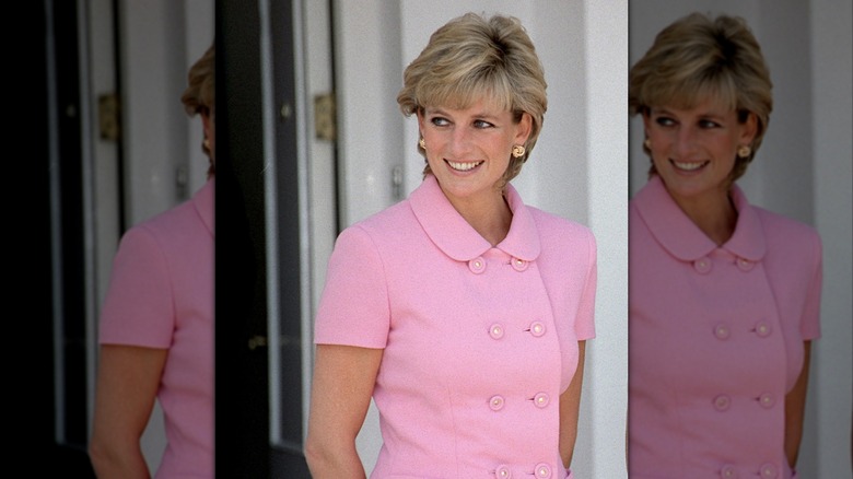 Princess Diana wearing a pink suit dress with large buttons and a Peter Pan-style collar