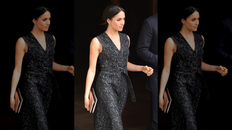 Meghan Markle wearing a sleeveless black outfit at Stephen Lawrence's memorial