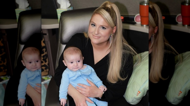 Meghan Trainor posing with her son Riley