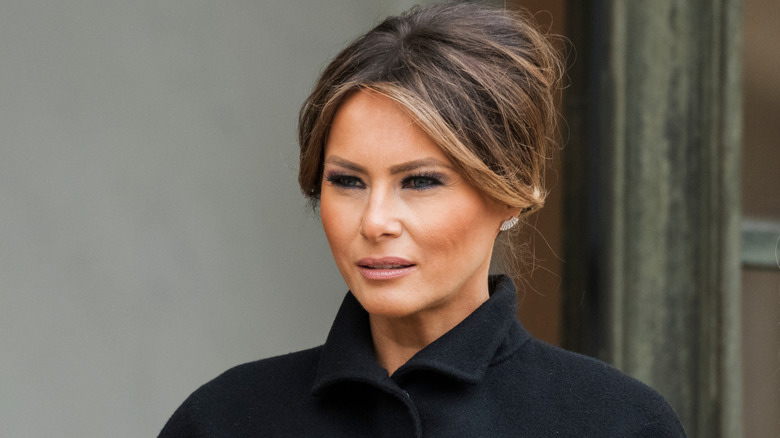 Melania Trump in black coat
