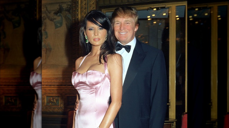 Melania Trump with side-swept bangs, and Donald Trump