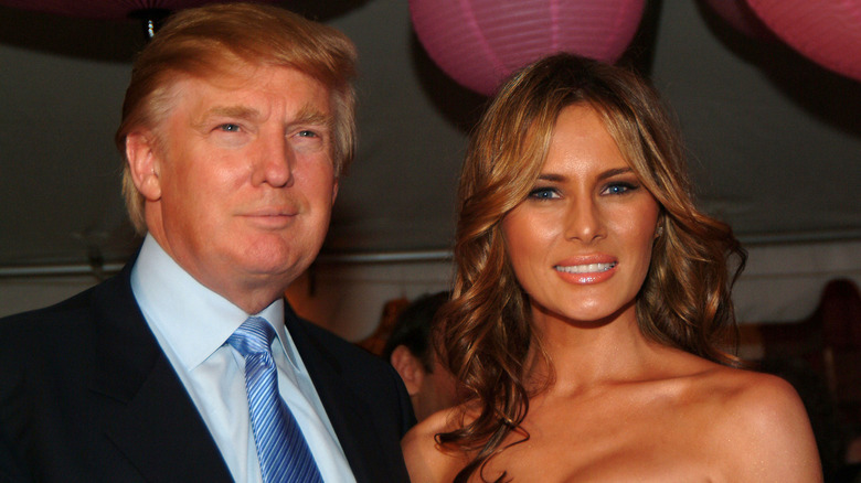Melania and Donald Trump in 2005 posing for the camera