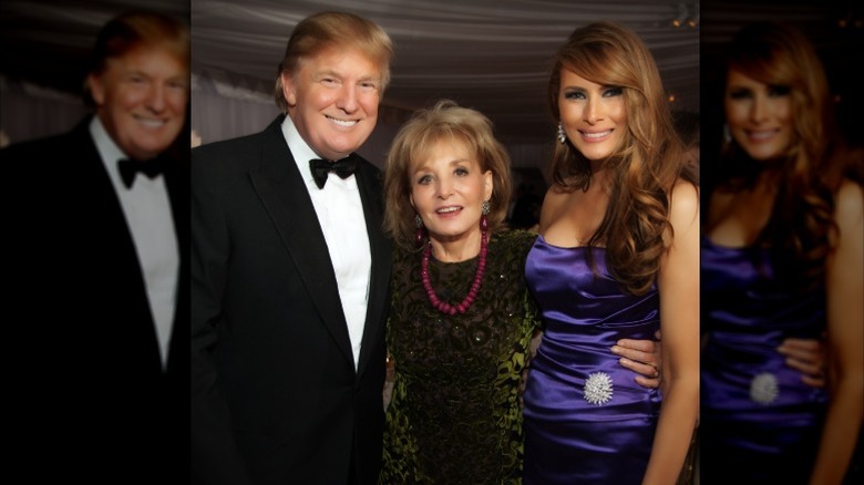 Donald and Melania Trump pose with Barbara Walters at Ivanka's wedding