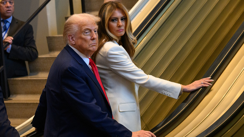 Donald and Melania Trump taking an escalator ride