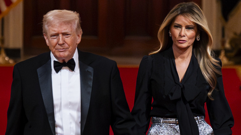 Donald and Melania Trump entering the 2026 Governors Dinner with neutral outfits