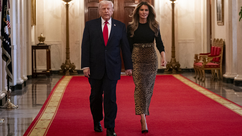 Melania Trump walking with Donald Trump on red carpet