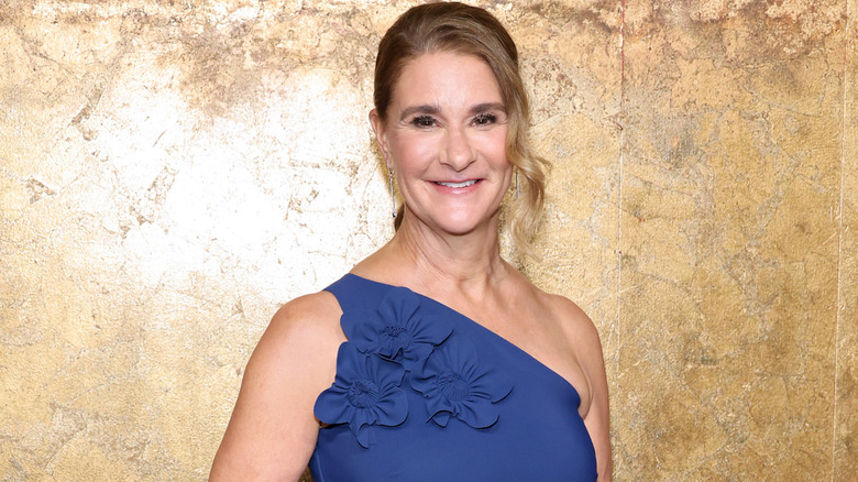 Melinda Gates, post-divorce, wearing a blue dress at Clooney Foundation For Justice's "The Albies"