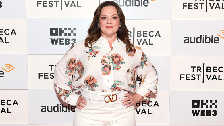 Melissa McCarthy poses for photos with her hands on her hips