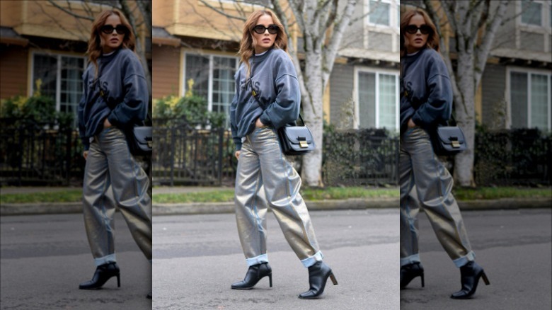 woman wearing metallic pants and sweatshirt