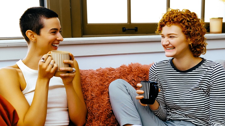  couple talking with coffee