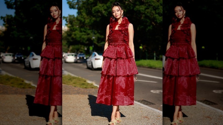 woman in crimson luxury gown