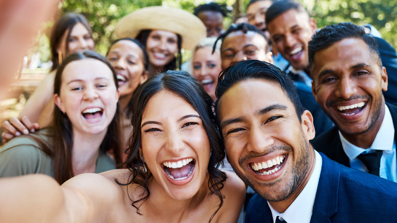 newly married couple with guests