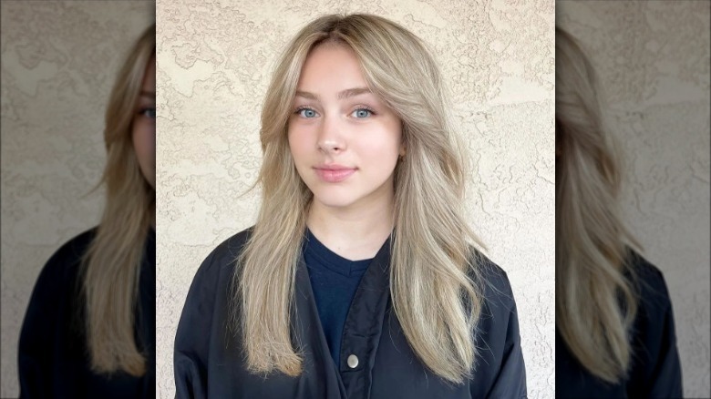 woman with milk tea blond hair 