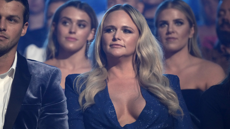 Miranda Lambert sits in the audience of an award show