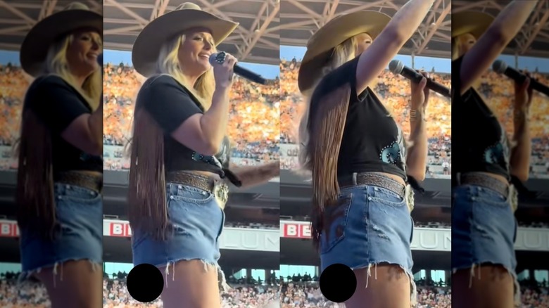 Miranda Lambert sings on stage during a concert in a short skirt