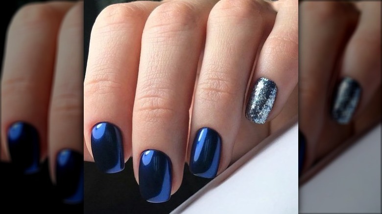 hand with mirrored nails