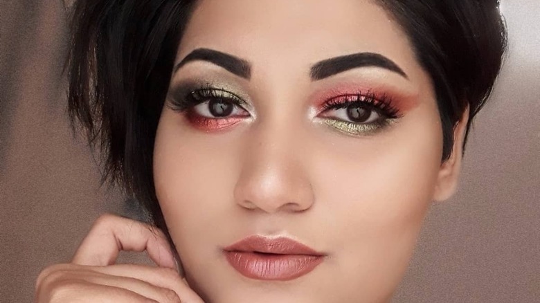 woman wearing mismatched chrome look