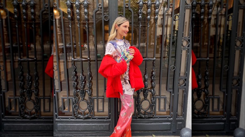 Girl wearing contrasting prints.
