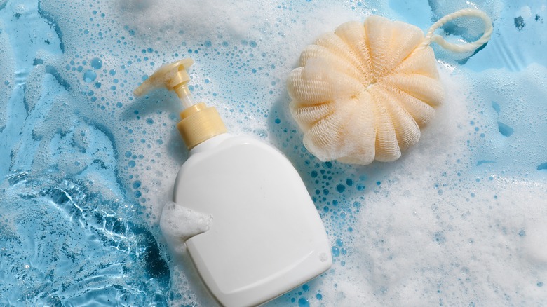 soap dispenser and loofah with bubbles