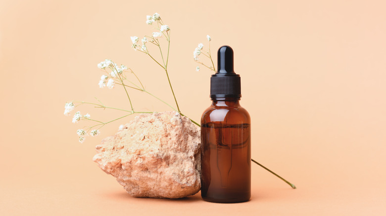 Essential oil in a brown bottle 