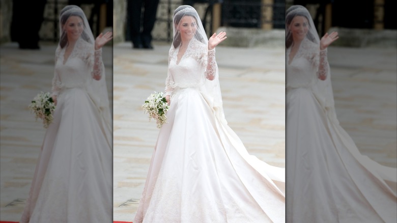Kate Middleton stands waving at Westminster Abbey before her wedding to Prince William.