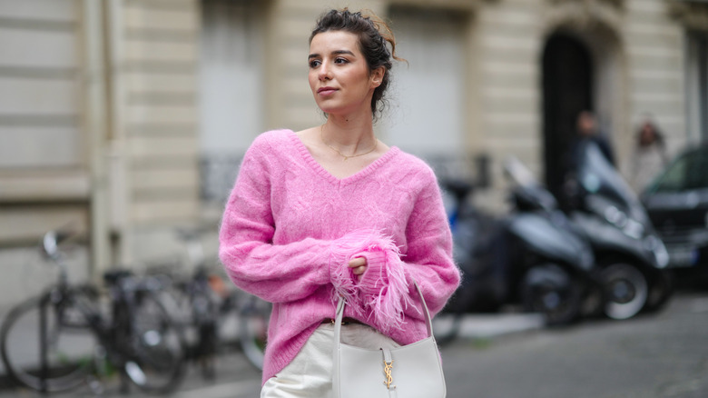 woman wearing pink mohair sweater