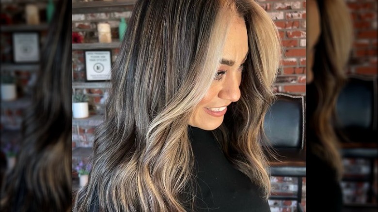 Golden money piece on brown hair