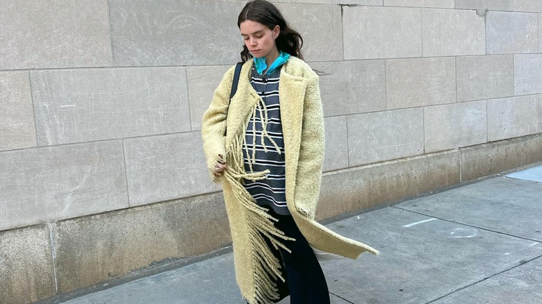 Black outfit with yellow jacket