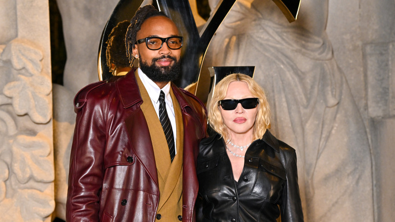 Akeem Morris and Madonna posing