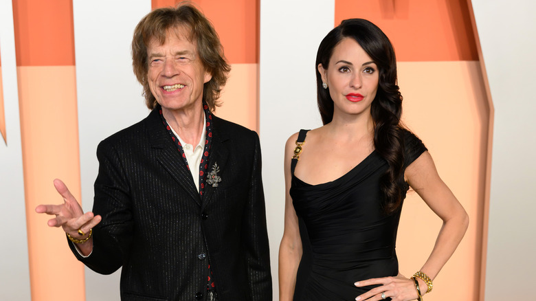 Mick Jagger and Melanie Hamrick posing for photos