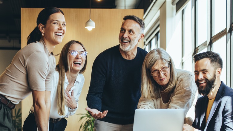 Happy teamwork at the office 