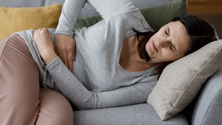 Model depicting abdominal pain