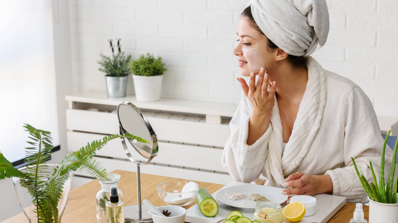 woman applying homemade mask