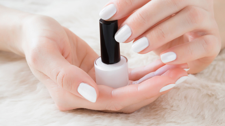 Woman with white manicure