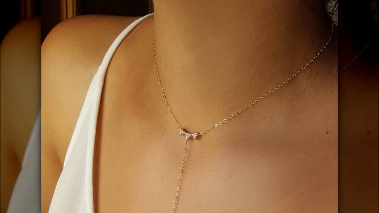 Girl wearing a simple chain necklace