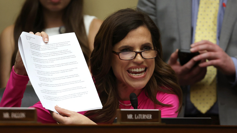 Nancy Mace in court holding up a piece of paper
