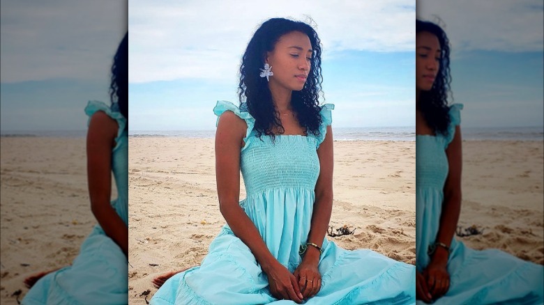 Woman sitting on beach