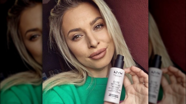 Woman with primer and matte makeup