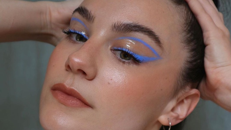 blue negative space eyeliner look