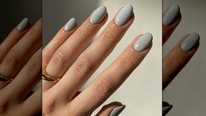 hand with gray fingernails