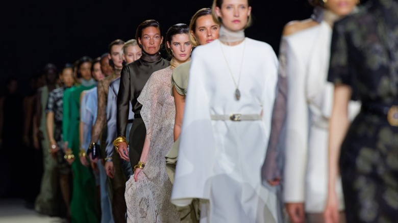 A line of models on a catwalk