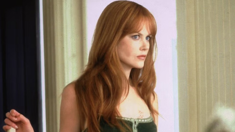 Nicole Kidman acting in "Practical Magic" with her reddish wig