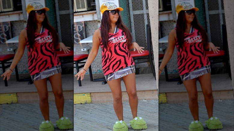 Nicole 'Snooki' Polizzi walks around Seaside Heights in a tank top and animal slippers