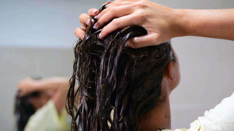 woman with mask in hair