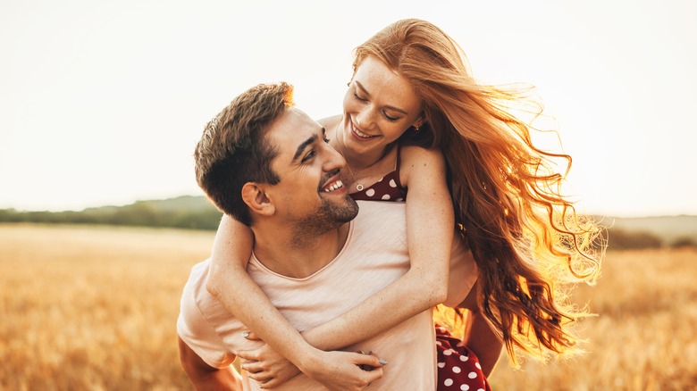 Caucasian couple in a field