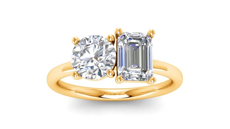 Person wearing double-jewel ring